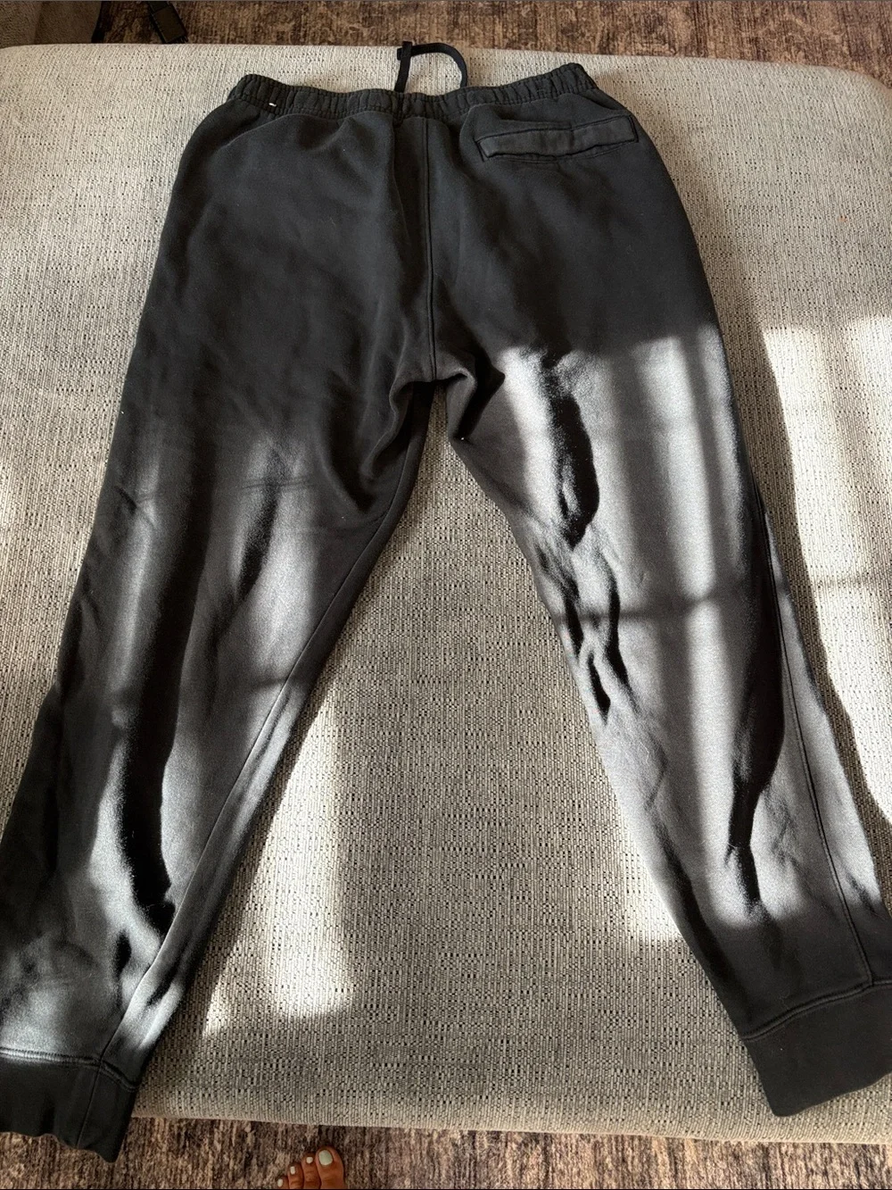 Nike Black Jogger Sweatpants with White Swoosh